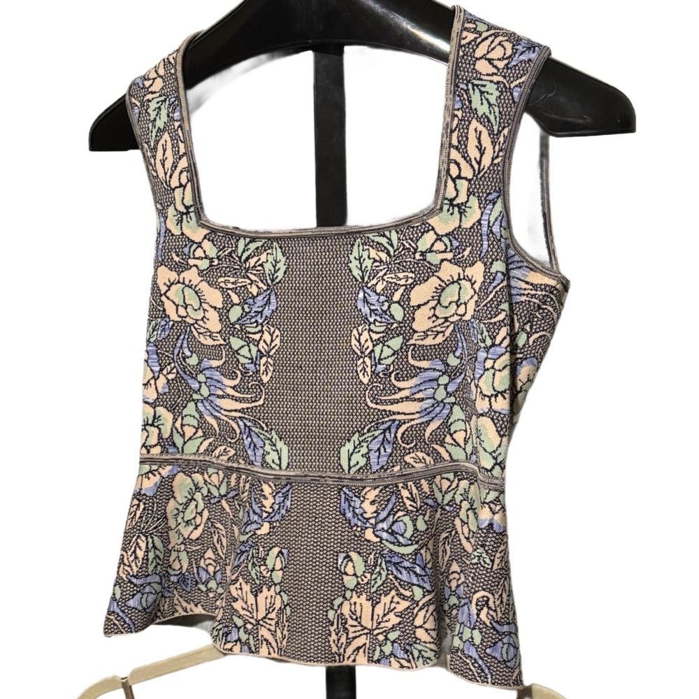 Like new.Barely worn.BCBG MaxAzria Knit Jacquard Peplum Top.No rips tears stains